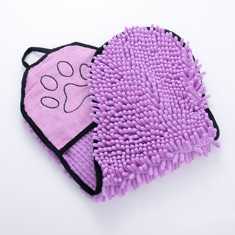 Purple microfiber cleaning pad with a paw print design on a white background