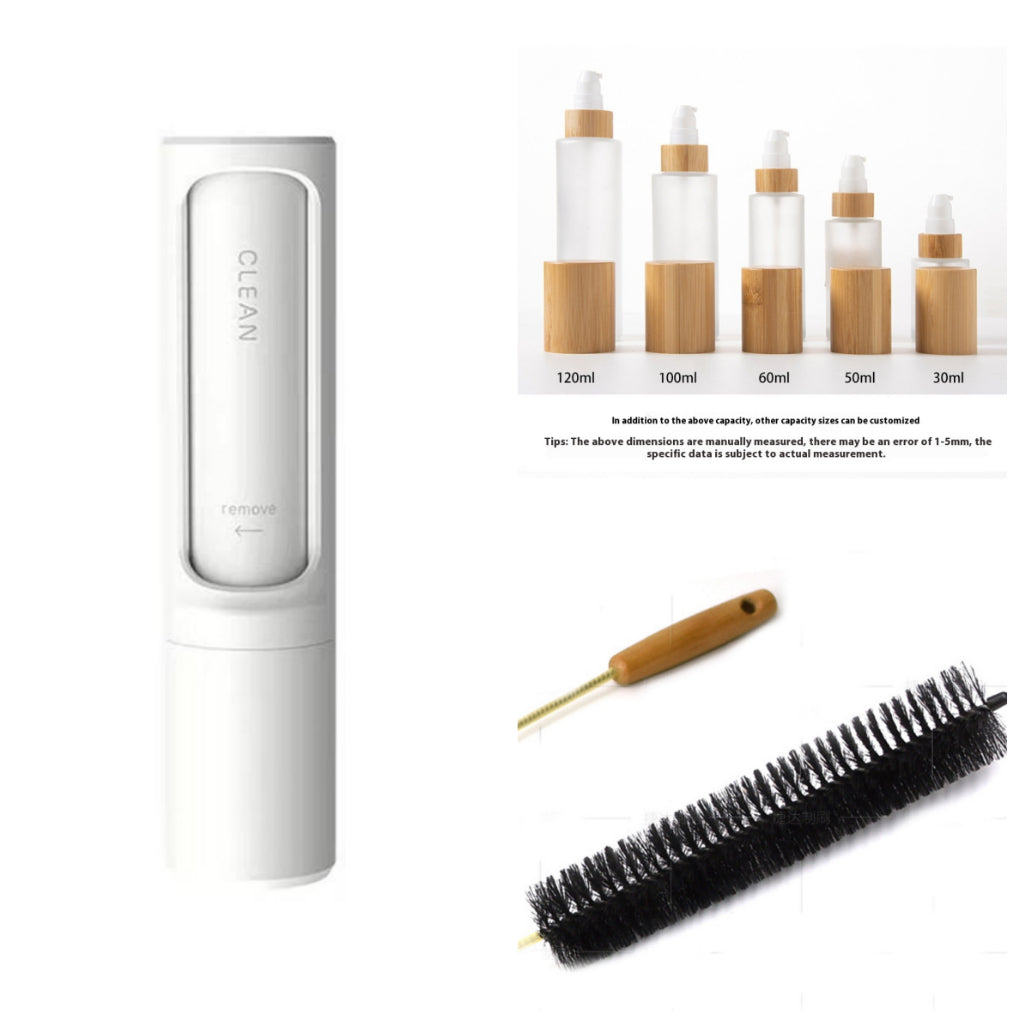 Cosmetic packaging set with bottles, brush, and cleaning tool on a white background