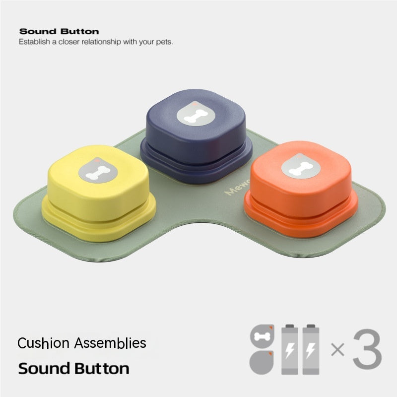 Colorful pet toy with cushion assemblies and a sound button on a white background