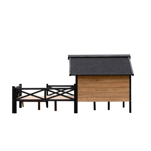 Outdoor wooden pet house with black roof and attached fenced run, ideal for small pets