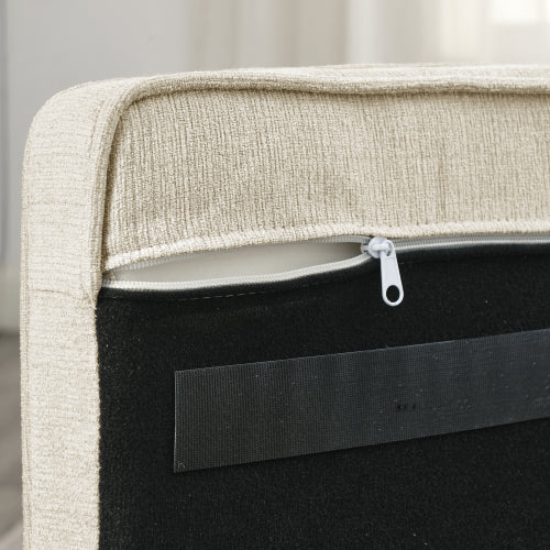 Close-up of a beige fabric surface with a zipper and black interior.