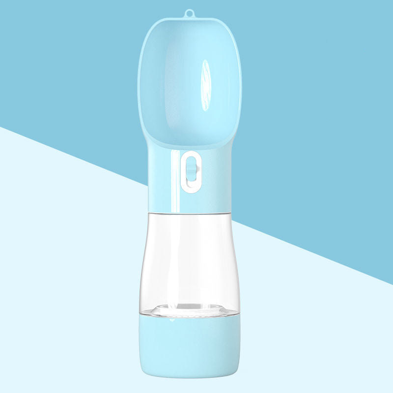 Clear water bottle with blue accents on a light blue and white gradient background