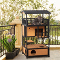 Cat tree with multiple levels on a balcony with plants and a view of trees and water.