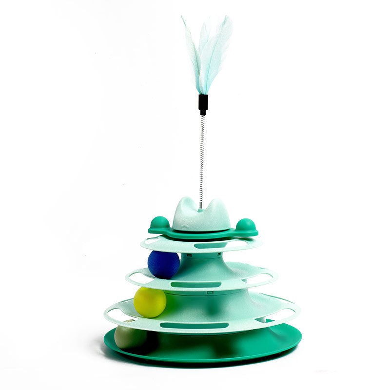 Green pet toy with multiple levels and a feather on a white background