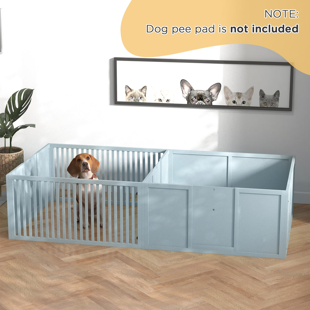Dog in a pet playpen with a framed picture of cats on a wall.
