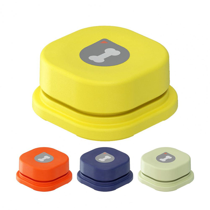 Yellow dog toy with smaller toys in orange, blue, and green on a white background