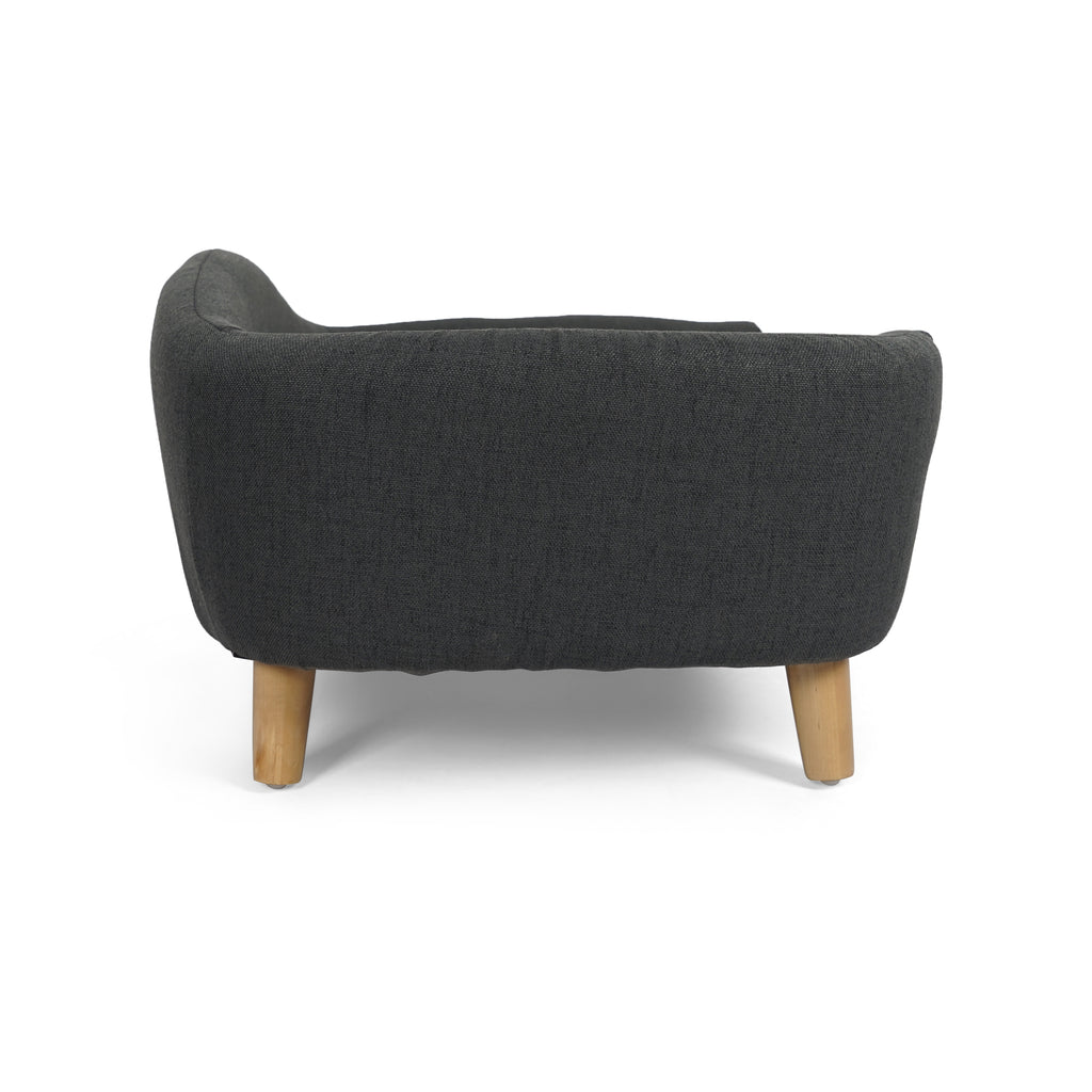 Dark gray armchair with wooden legs on a white background